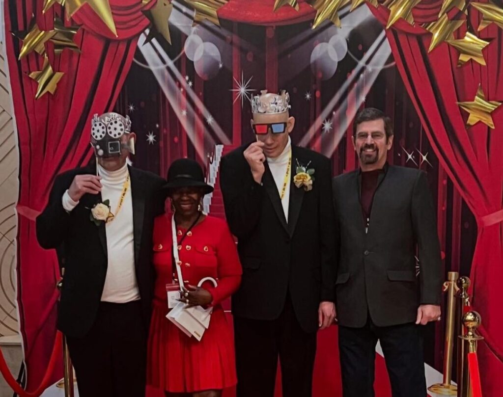 disabled people taking a picture on a red carpet event disabled people taking a picture on a red carpet event